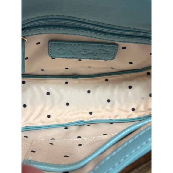 ON 34th Small Curve Bottom Crossbody Bag Sea Spray Faux Leather NWT - Picture 8 of 10
